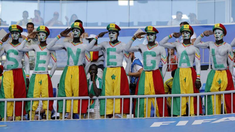 Supporters of Senegal pose prior to the group H match between Senegal and Colombia. Photo: AP Photo/Efrem Lukatsky