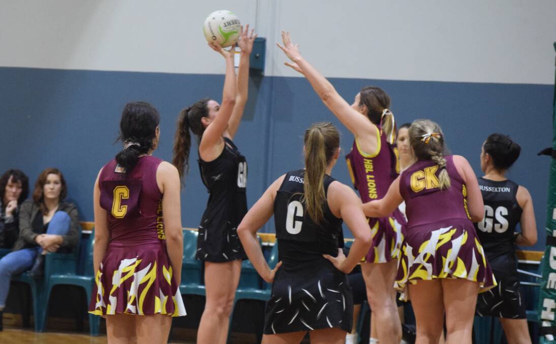 Busselton Magpies reserves team goal attack Lana Lester taking a shot with goal shooter Jade Craigie and centre Taylah McKay watching on. The Magpies unfortunately lost with a final score of 43 to 34. Photo by Emma Kirk.