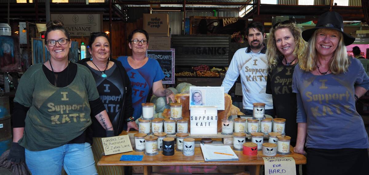 Some of the Shed Markets' stall holders wearing custom-made I Support Kate t-shirts for the ongoing fundraiser in Abbey. Photo by Lily Yeang. 