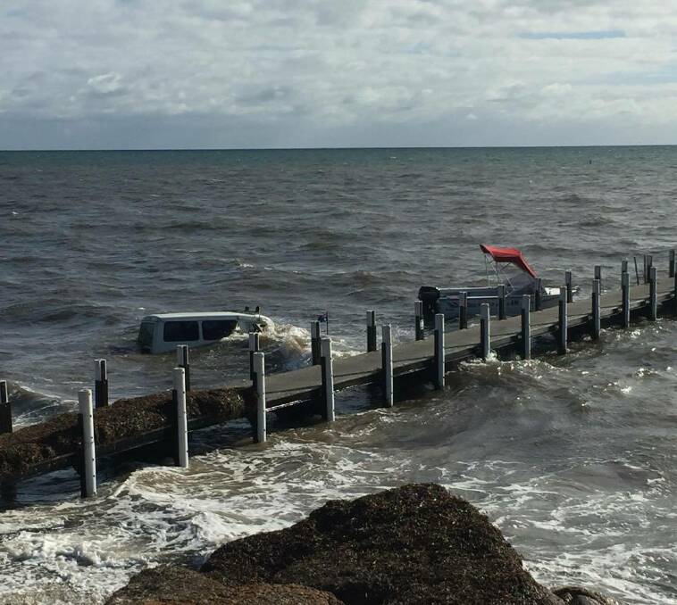 One Busselton boatie has had a day to forget after strong waves washed his four-wheel drive into the ocean at Abbey Boat Ramp last week. Photo by Louise de Jager.