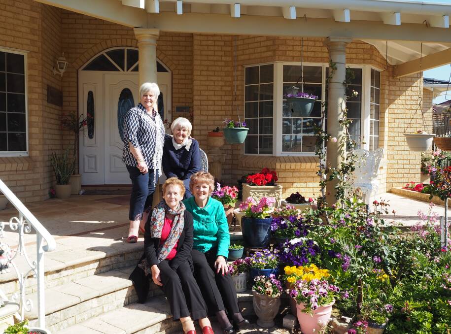 Jean Cook, Jacynth Reid, Wendy Daw and Margaret Swain at the site of Open Garden Day, an event raising funds for the Motor Neuron Association. Photo by Lily Yeang.