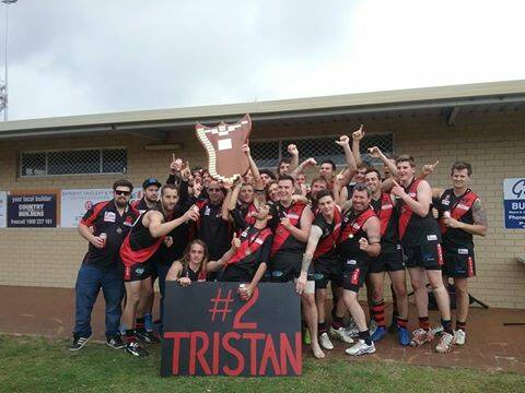 The Busselton Bombers celebrating their Onshore Cup win. Photo supplied. 