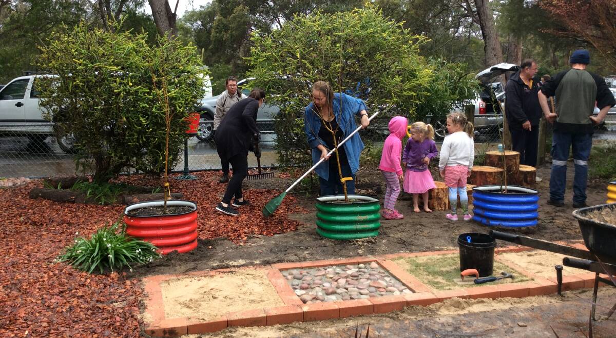 Volunteers both young and old helped to make Capel pre-primary's nature play area on September 10. The new playground features a sensory walkway, bike track, bird bath and log steppers that blend in with the landscape. 