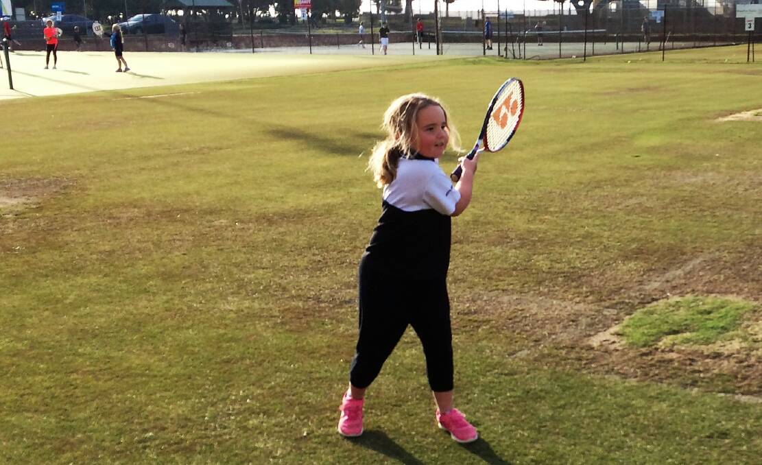 Elise learning to forehand. By the end of Game Face she was able to consistently return both forehands and backhands. Game Face is $5 a week, or free for members.