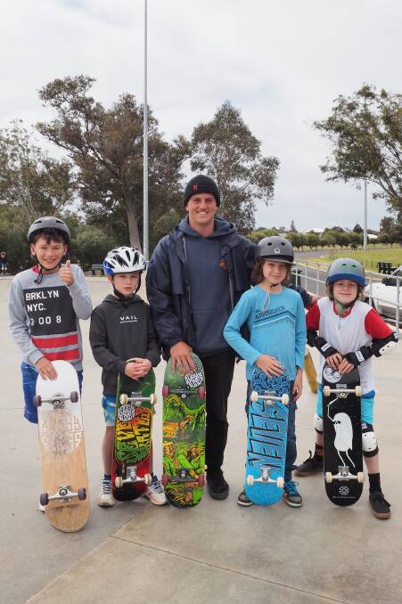 Will Barker, Max Steinberg, Floyd Donnan and Cooper Howes with coach Lachlan Micale during one of the Tailtap skateboarding clinics at Dunsborough Skate Park.