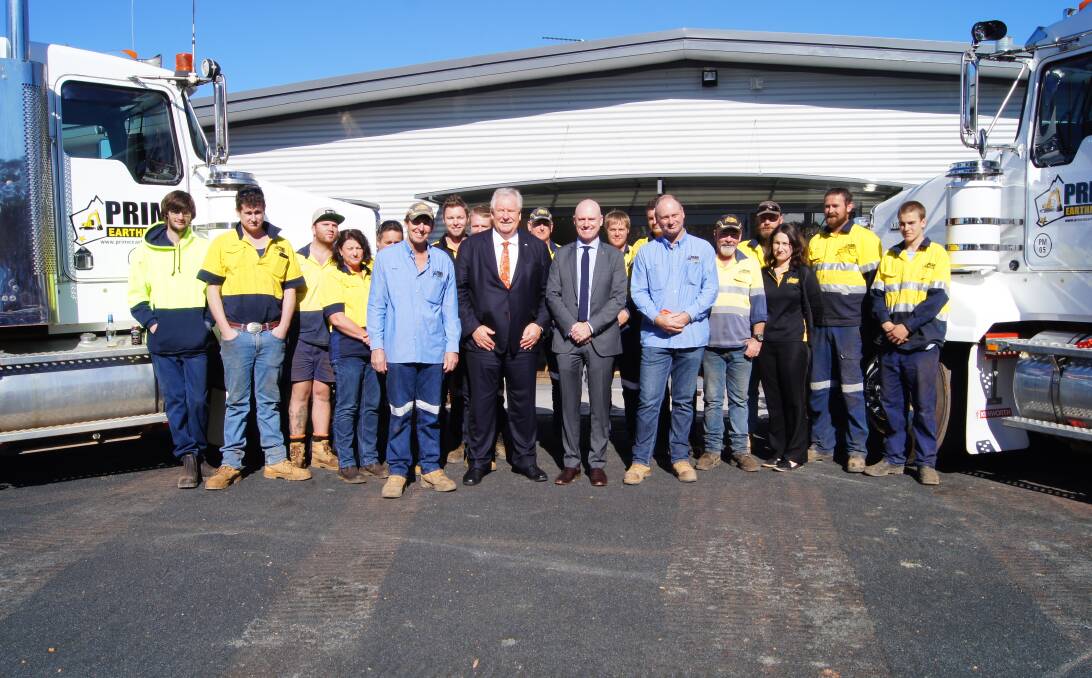 The Prime Earthmoving crew joined Mark McDonald, South West MLC Barry House, Mines and Petroleum and Small Business Minister Sean Kimberley L'Estrange and Paul Tognela to celebrate the opening of the company's new depot. 