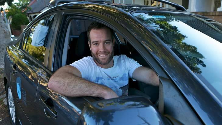 Carl O'Sullivan with his Mazda3 that he rents out to strangers as part of  car-sharing scheme Car Next Door. Photo: Dallas Kilponen
