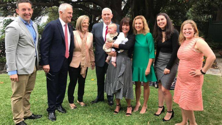 Malcolm Turnbull and wife Lucy, with Mike Pence and wife Karen (holding Malcolm Turnbull's granddaughter Alice) at Kirribilli House on Saturday April 22 2017. With Turnbull's daughter Daisy (far right) and her husband James Brown (far left), and Pence's daughters Charlotte and Audrey.??  Photo: Twitter: Malcolm Turnbull