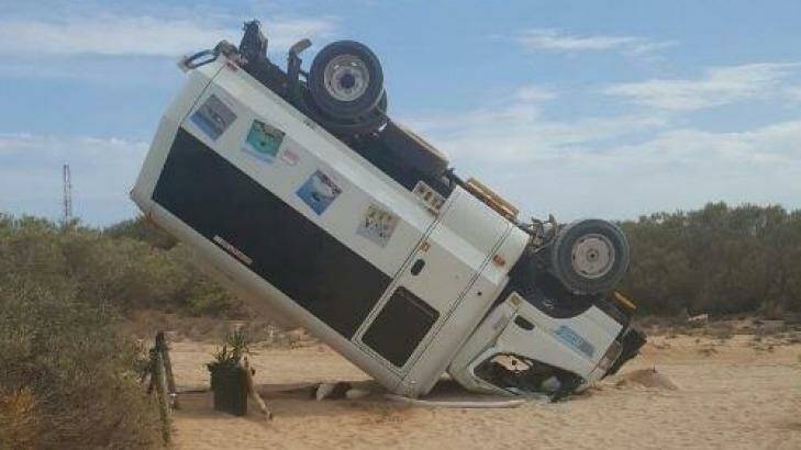 A tourist bus was flipped onto its roof during a forklift rampage on Thevanard Island. Photo: WA Police