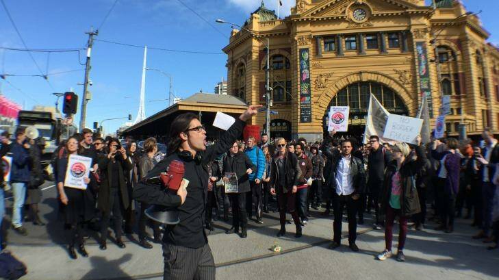 Protesters rally against the Australian Border Force in Melbourne last week over the aborted joint operation in the CBD. Photo: Joe Armao