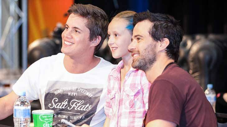 Johnny Ruffo and Charlie Clausen pose for a photo with a young admirer. Photo: Anna-Nicole Del-Re
