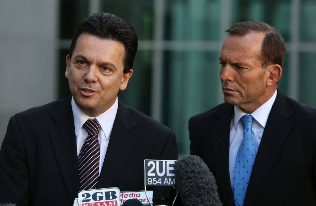 Independent Senator Nick Xenophon and Prime Minister Tony Abbott. Senator Xenophon has called for greater transparency around extra entitlements for former PMs. Photo: Penny Bradfield