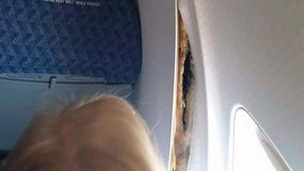The crack in one cabin wall of the Boeing 757. Photo: James Wilson, Facebook