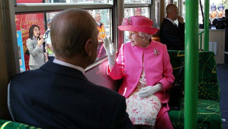 The Queen rides a tram through Melbourne. Photo: COPPEL ALEX