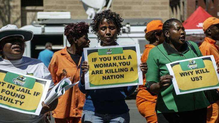 Controversial ruling ... African National Congress Women League members demonstrate outside the High Court in Pretoria. Photo: AFP