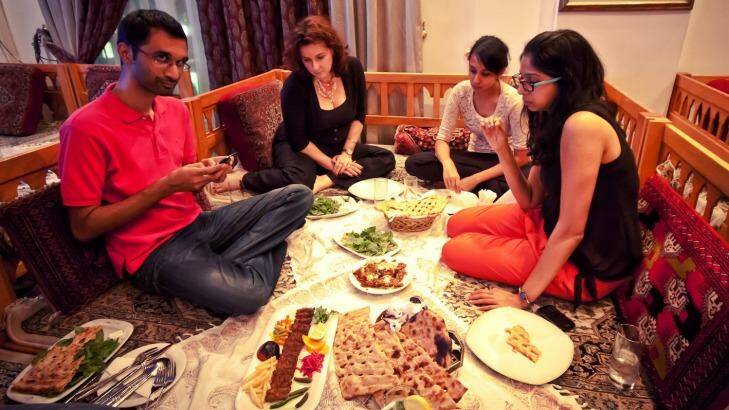 Enjoying a traditional Iranian meal. Photo: Airspectiv Media