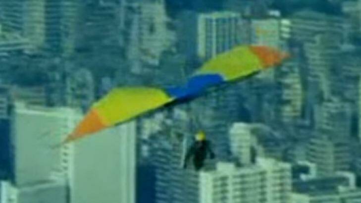 Grant Page flies a hang-glider over Hong Kong for The Man From Hong Kong. Photo: Screen grab