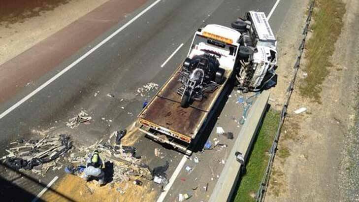 The scene of the truck crash that caused an asbestos hazard on Kwinana freeway. Photo: Nine News