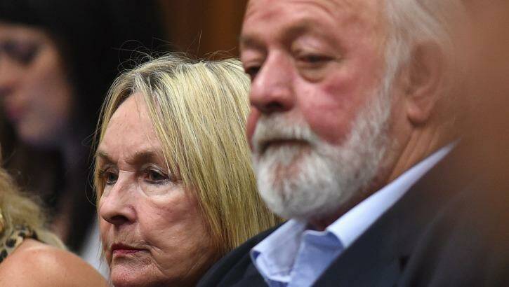 Dignified silence ... The parents of victim Reeva Steenkamp, June (left) and Barry listen to the ruling. Photo: AFP
