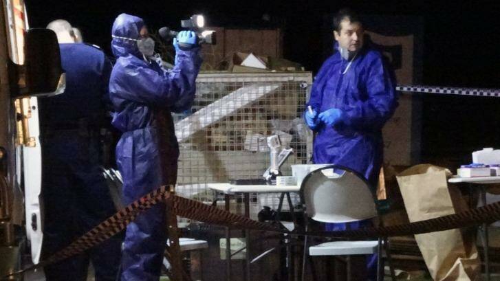 Forensic officers at the crime scene in Yanchep. Photo: Graeme Powell / ABC News