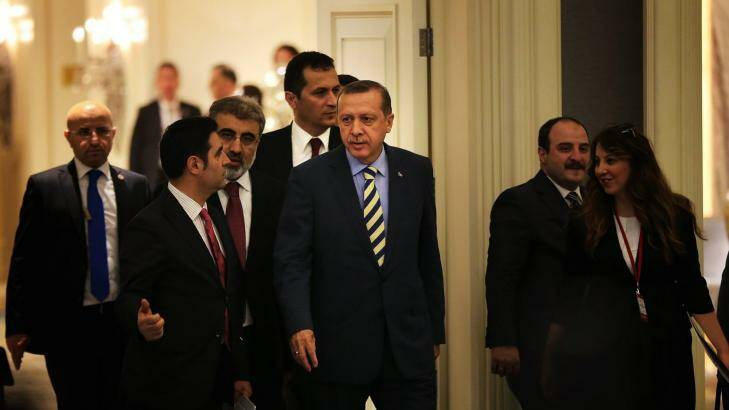 Centre of power: Recep Tayyip Erdogan (in striped tie) arrives at Istanbul's Shangri-La Hotel on May 29 to sign off on a natural gas project with Azerbaijan. Photo: Kate Geraghty