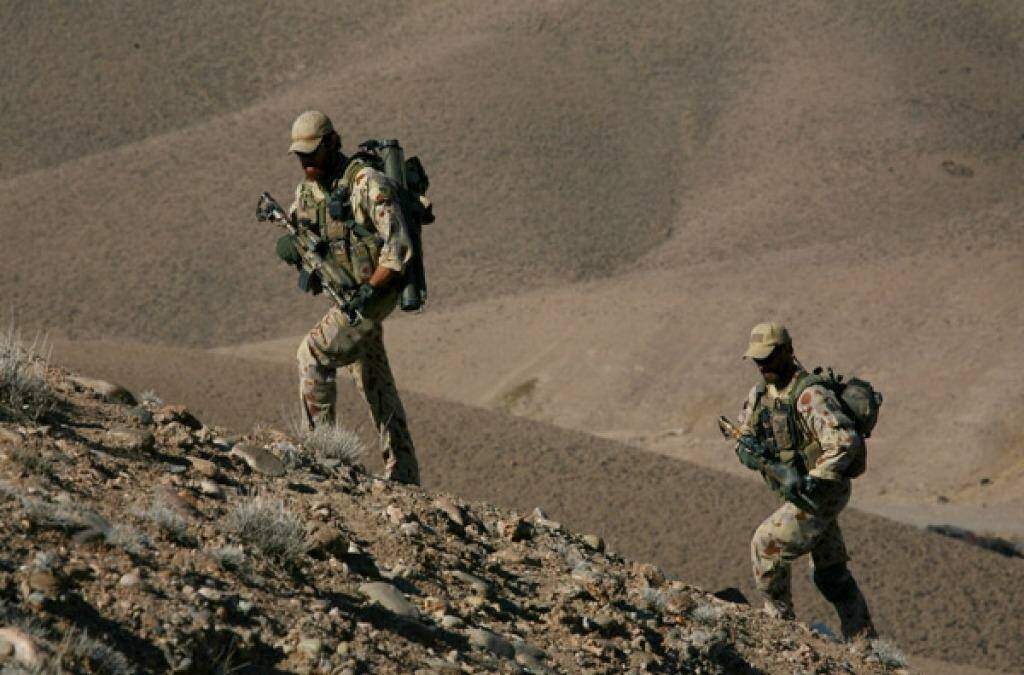 Soldiers of the Special Operations Task Group patrol in Oruzgan Province of Afghanistan.