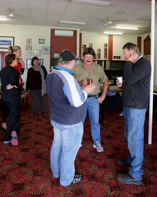 Meet and greet at the Dumbleyung District Club: Robbie McDougall and Rod Frost discussing important replica building issues with Mark Motzouris. In background are Louisa Dare, Chelsea Mott and Jacki Ball.