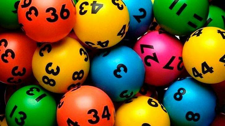 twenty-five years of playing Lotto finally paid off for two Perth mates. Photo: Alice Archer