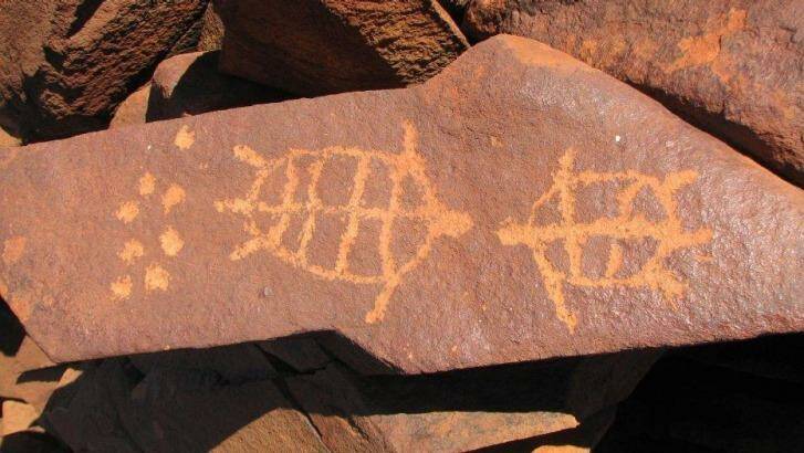 There are more than a million petroglyphs, some dating back 30,000+ years, on the Burrup Peninsula.  Photo: Murujuga Aboriginal Corporation