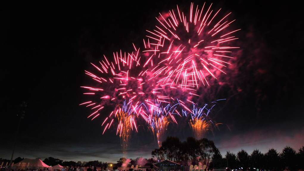 ORANGE: Fireworks light up the Orange skyline. Photo: STEVE GOSCH