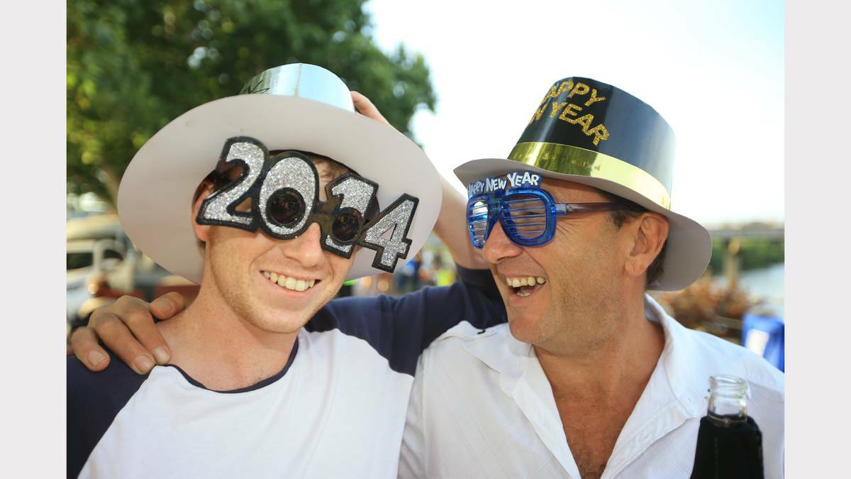 NEWCASTLE: New Years Eve Celebrations at Maitland - shows Jarrod Watson and his father Michael Watson [both of Metford]. Photo: PETER STOOP
