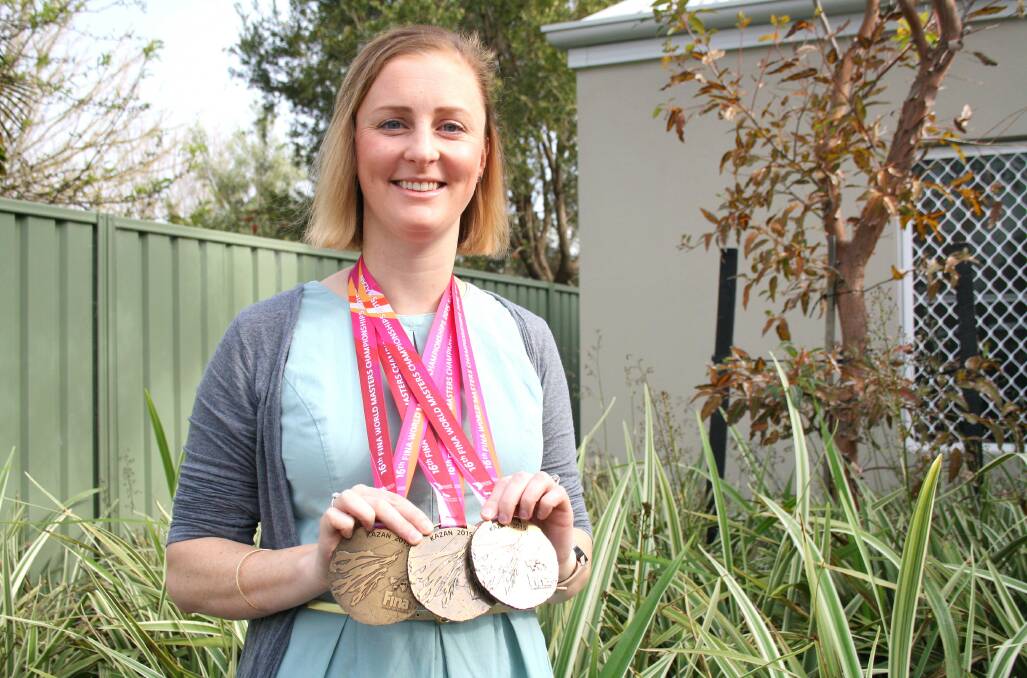 VICTORIOUS: New Busselton GP Eliza Cole won three gold medals for diving at the FINA world masters aquatic championships in Russia in August.  