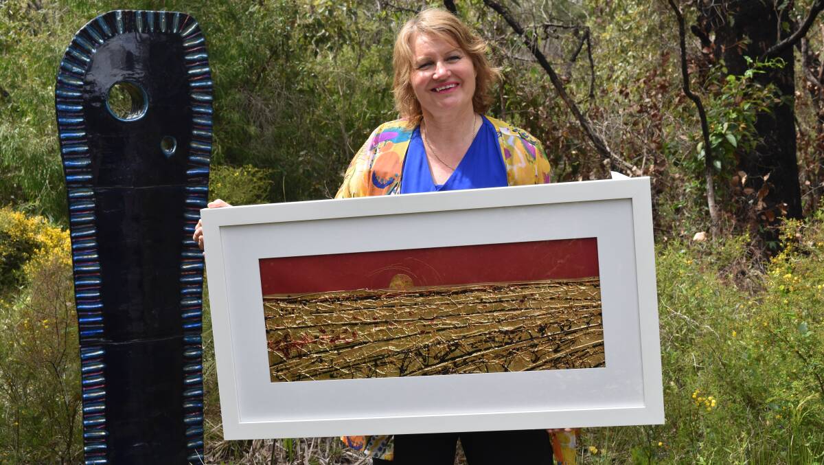 First place: Karin Luciano with her Nannup Art Exhibition award winning piece.