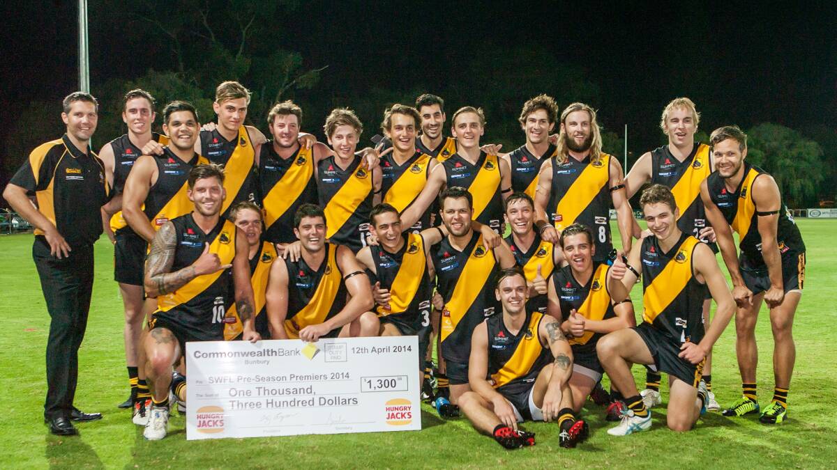The Bunbury Bulldogs with a Hungry Jack's cheque after winning the pre-season carnival.