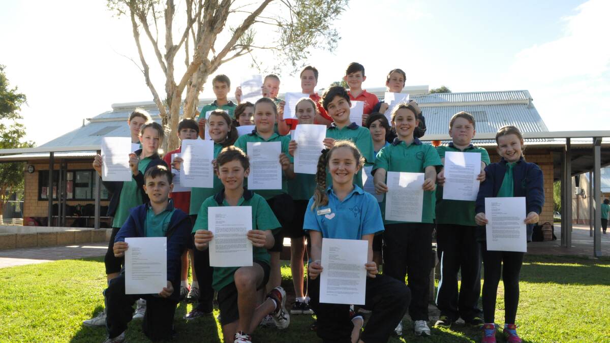 Students from Geographe Bay Primary School with their letters to the fisheries minister the Honourable Ken Baston MLC. 

