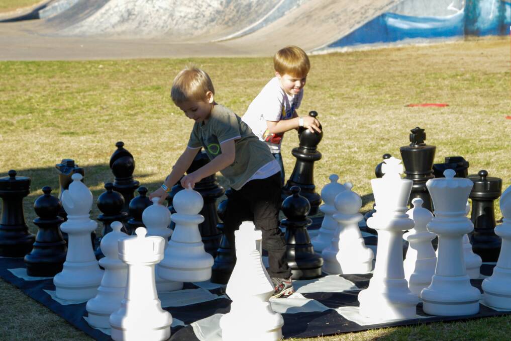 Archie Gethin and Tomas Kraske played some giant chess from Crazy Fun Amusement Hire.