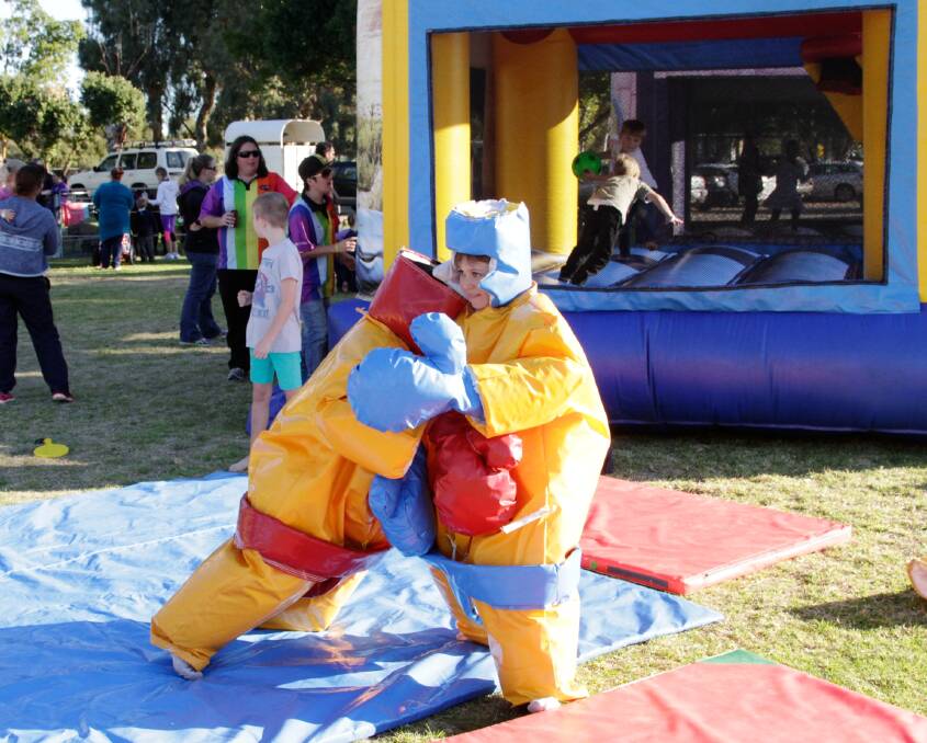 The boys got down and dirty in the sumo wrestling game by Crazy Fun Amusement Hire.