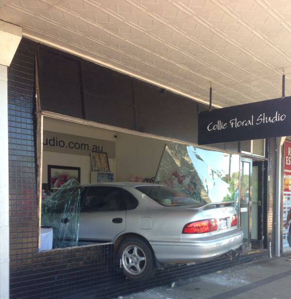 A car smashed through the window of a shop on Forrest Street.