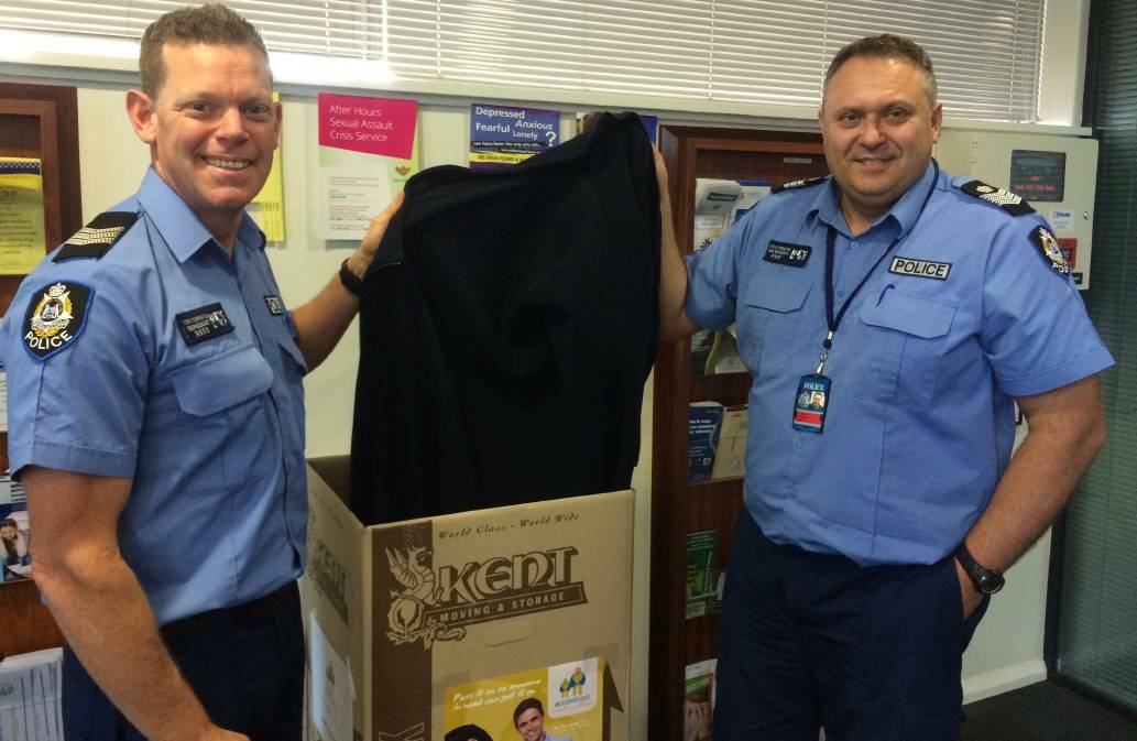Busselton police senior sergeant Steve Principe and sergeant Todd Carrington help keep residents warm this winter by taking part in the AccordWest Coat-A-Thon.