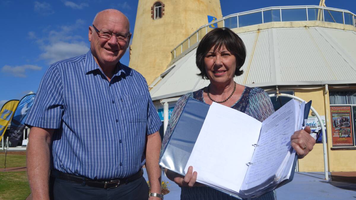 City of Busselton mayor Ian Stubbs with Glenys Cope and her petition containing over 2000 signatures. 