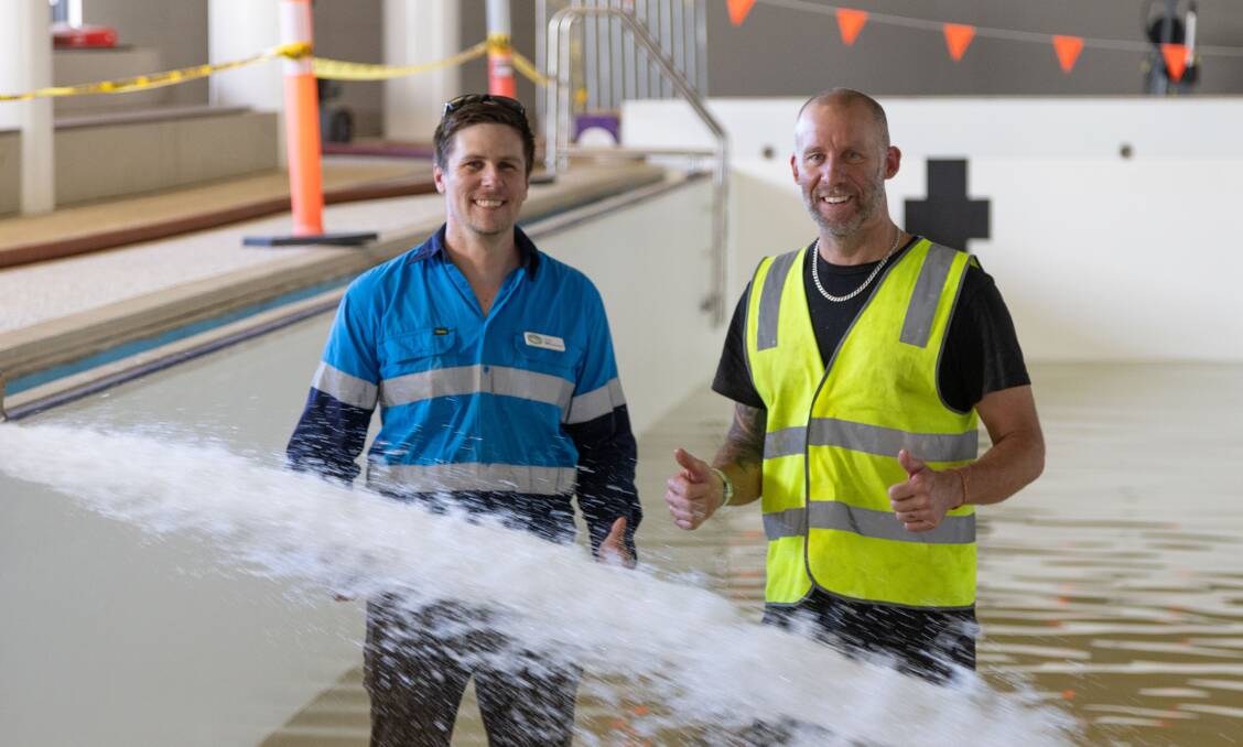 Project Manager Chris Yates and Recreation Centre Manager, Dylan Brown at the pool as it is filled ahead of this weekend's opening party. 