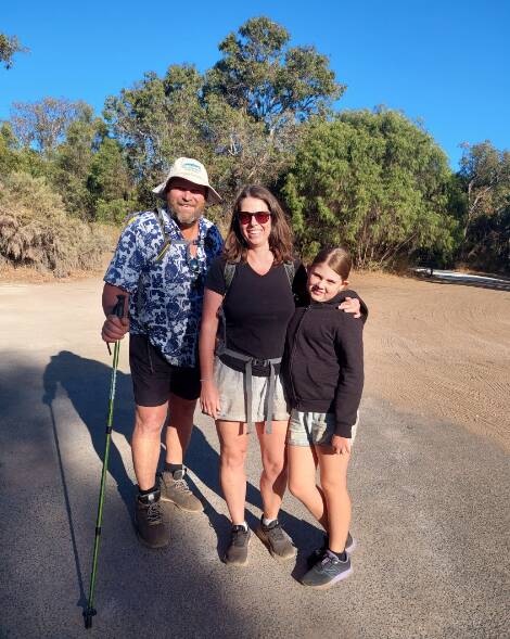Chloe Paris-Muller (right) with parents Andrew and Stephanie on their most recent adventure on the Cape to Cape Track.
