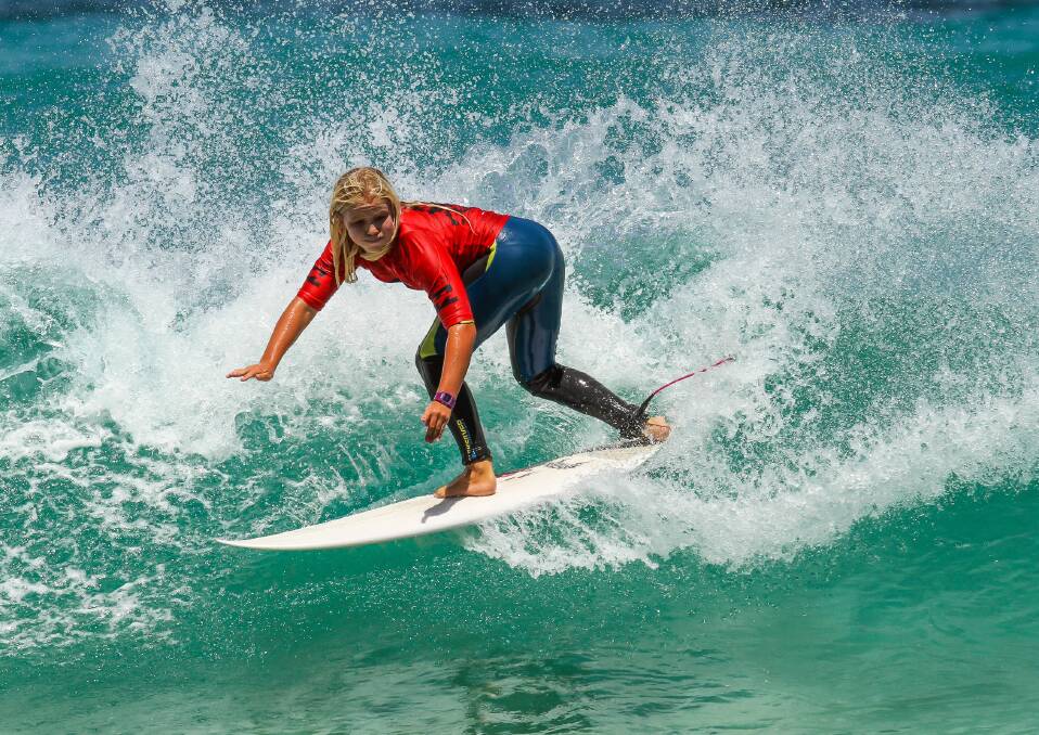 Riding the wave: Emma Caittlin at Small Fries, Yallingup. Photo: supplied.