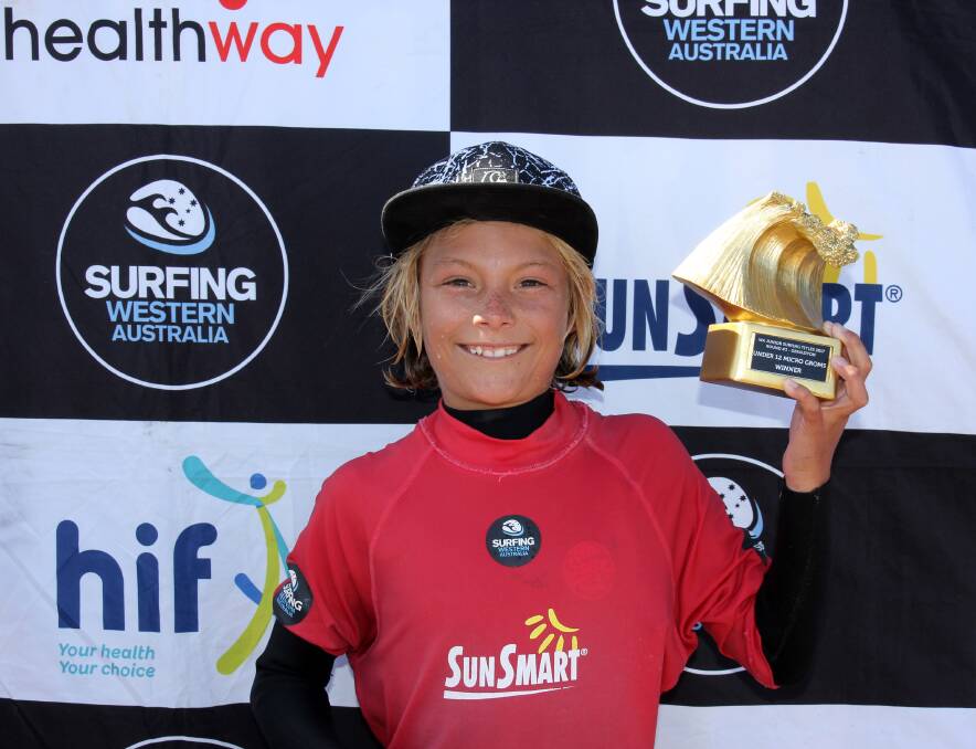 Popular winner: Macklin Flynn from Mandurah, claimed the Under 12 Micro Grommits trophy. Photo: Surfing WA.