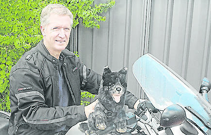 Steve Andrews with the Black Dog Ride mascot.