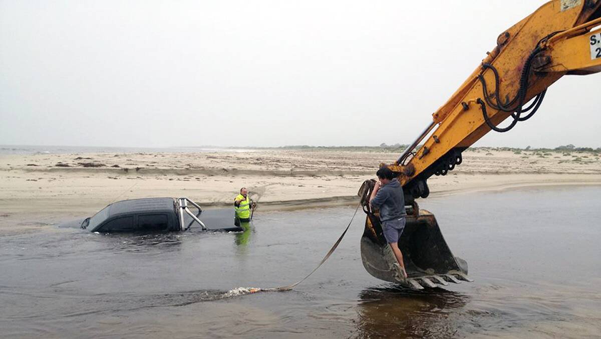 An excavator was called in to fish the cars out of water at Wonnerup. Photos by Geographe Marine Engineering.