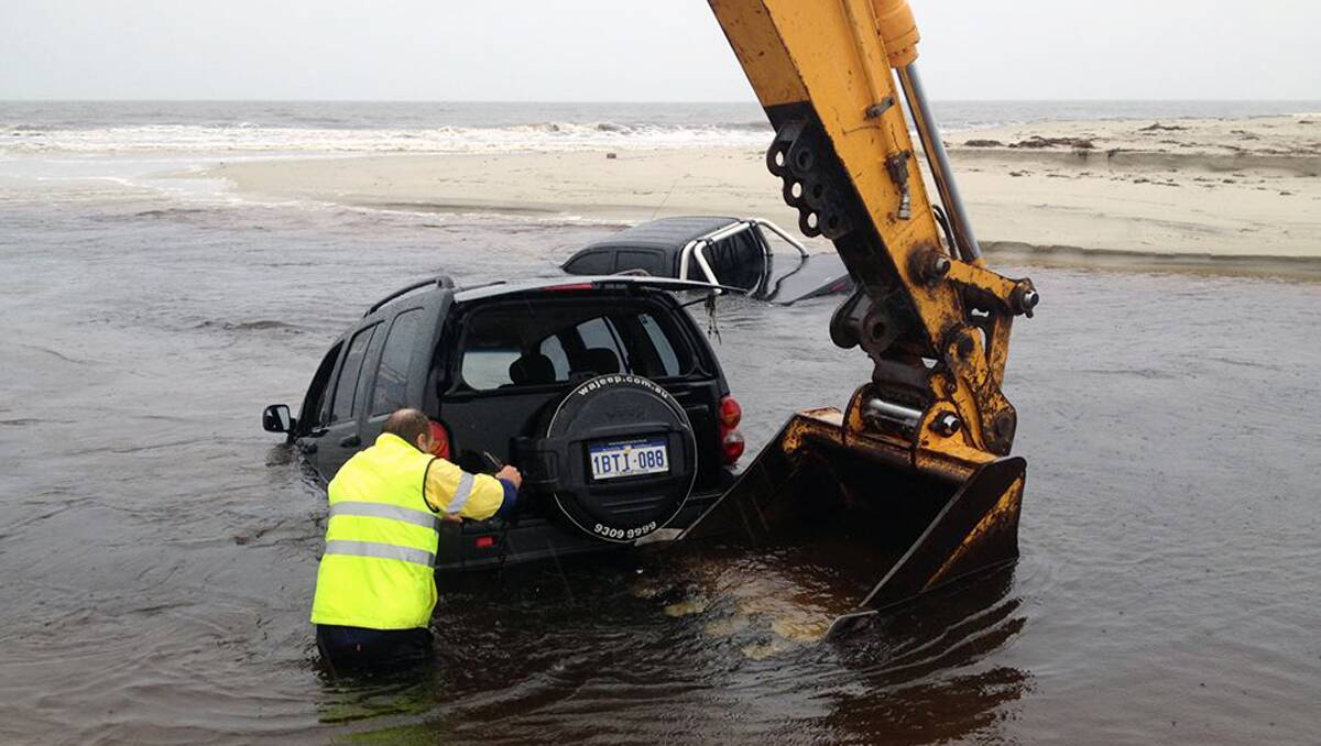 An excavator was called in to fish the cars out of water at Wonnerup. Photos by Geographe Marine Engineering.