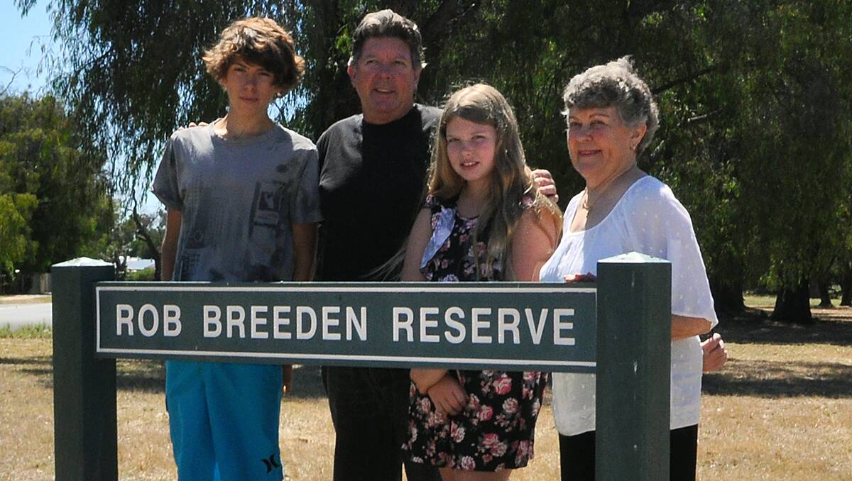Rob Breeden’s grandson Matthew, son Alan, granddaughter Laura and widow Crystal gather at the reserve named after him.
