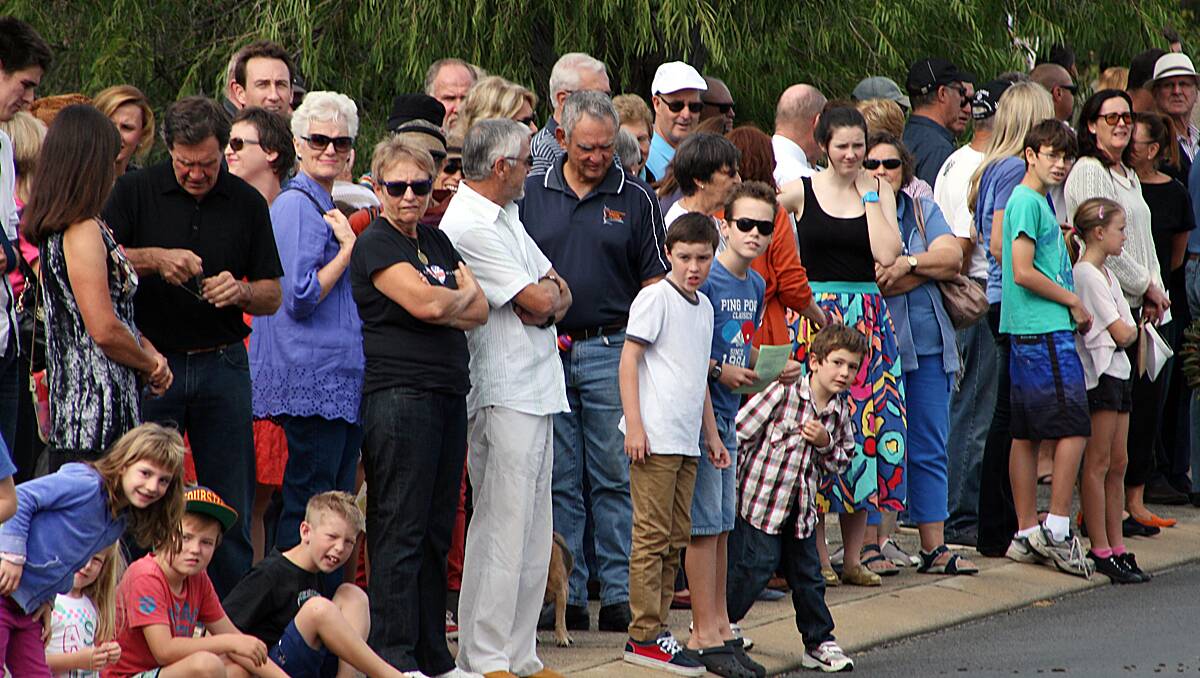 Can you spot any familiar faces in the crowds at the Dunsborough Anzac day service?