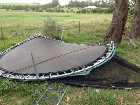 Warren Harvey in Esperance posted: "Tie your Trampoline down peeps, coz mine was hanging from a fence." 